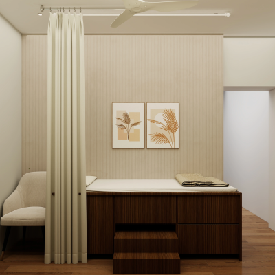 Minimalist medical examination room or spa treatment area featuring a wooden examination bed with steps, a privacy curtain, and beige vertical slatted wall paneling.